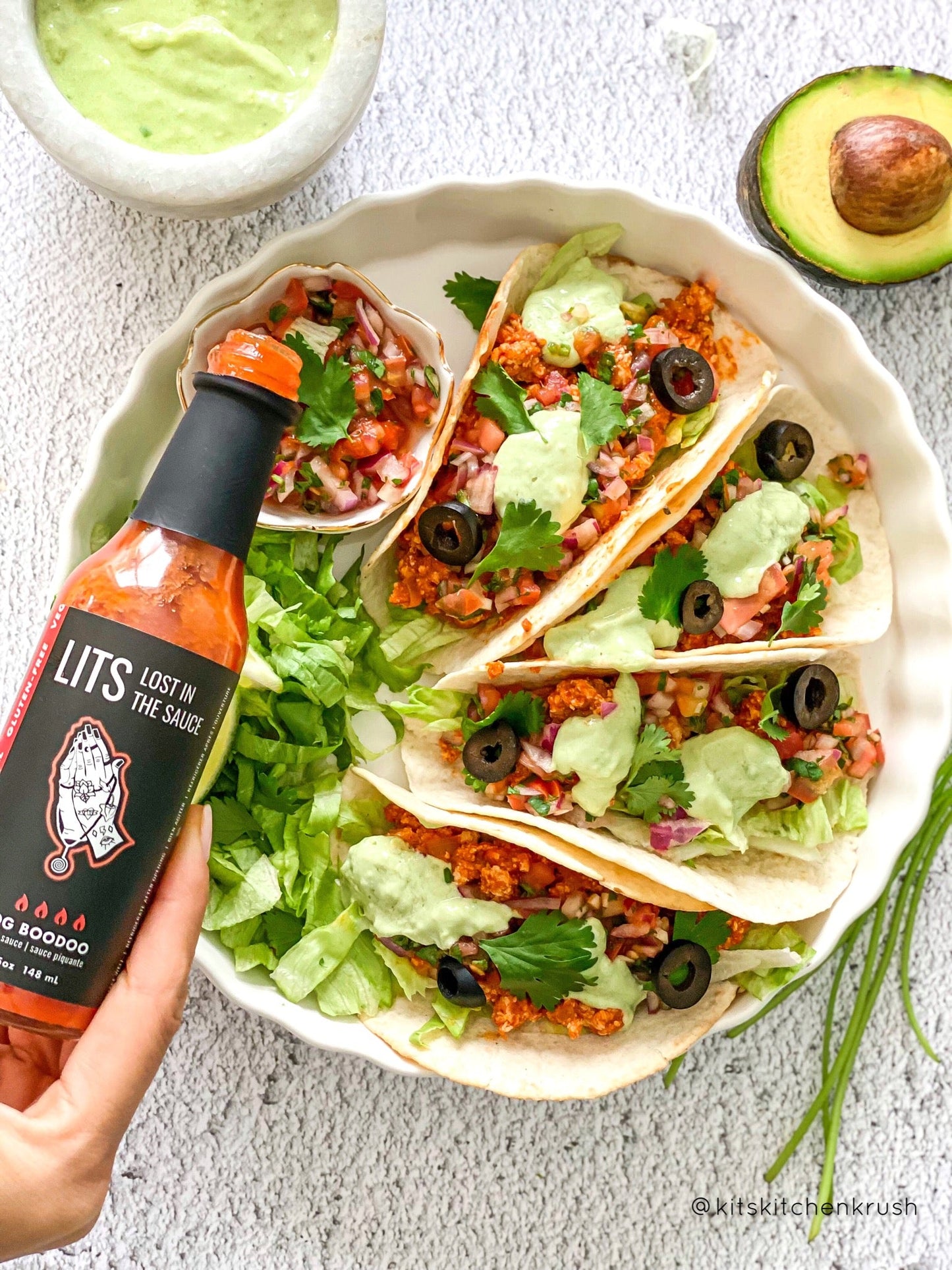Mexican-inspired crumbled tofu tacos with spicy OG Boodoo salsa and guacamole