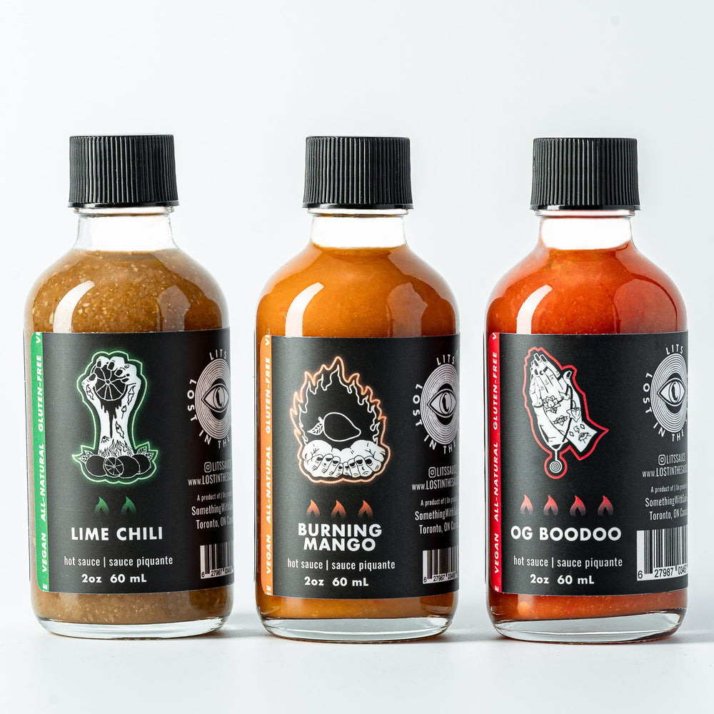 
                  
                    Lost in the Sauce LITS Flavour Flight hot sauce sampler set Toronto made in Ontario Canada - travel friendly hot sauce
                  
                