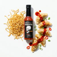 Bodhi sweet chili hot sauce bottle with crispy noodles and pan-fried dumplings drizzled in sauce (hover), photo 3